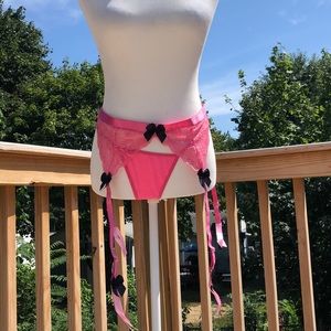 NWOT pink garter and panty set with black bows
